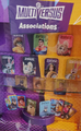 Display from a McDonald's restaurant featuring some of the MultiVersus-themed tins, character cards, puzzles, and sticker sheets (courtesy of @ChocoGlacer on Twitter).[16]